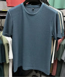 Verão masculino em torno do pescoço manga curta camiseta M-5XL oversize rugas resistente respirável textura superior tecido versátil t