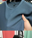 Verão masculino em torno do pescoço manga curta camiseta M-5XL oversize rugas resistente respirável textura superior tecido versátil t