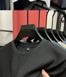 Verão masculino em torno do pescoço manga curta camiseta M-5XL oversize rugas resistente respirável textura superior tecido versátil t